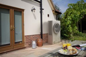 A Dimplex air source heat pump installed outside a domestic property