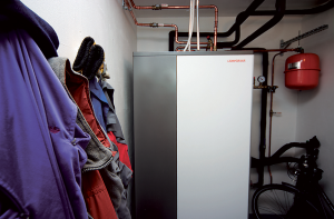 A Lampoassa ground source heat pump installed in a domestic closet