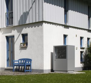 The LA-TU air source heat pump installed outside an industrial building