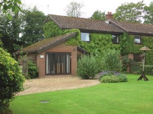 A photograph of Mr. and Mrs T's hoe where an air source heat pump was installed